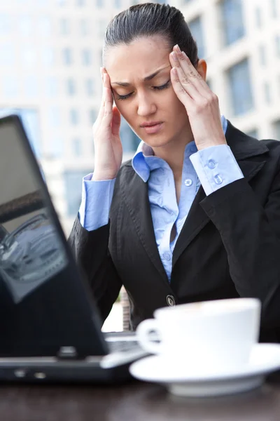Businesswoman with a problem Stock Photo