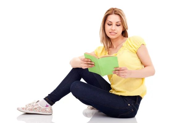 Young student reading book — Stock Photo, Image
