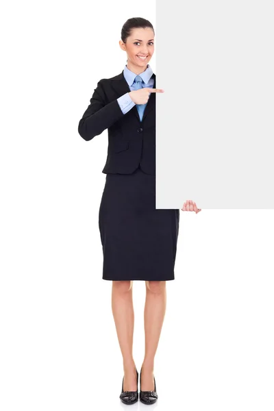 Mujer de negocios mostrando gran signo en blanco — Foto de Stock