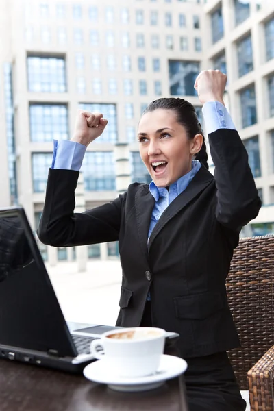 Businesswoman celebrating her winning — Stock Photo, Image