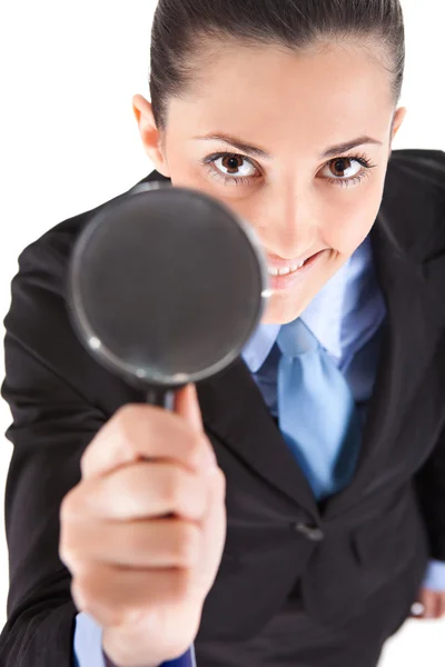 stock image Businesswoman holding magnifying glass