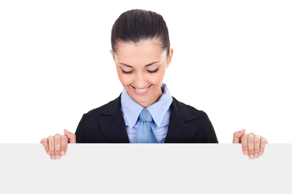 Business woman looking at blank board — Stock Photo, Image