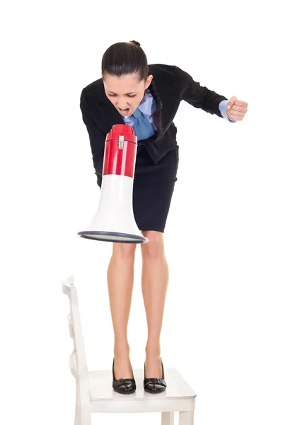 Mulher de negócios irritada gritando através de megafone — Fotografia de Stock