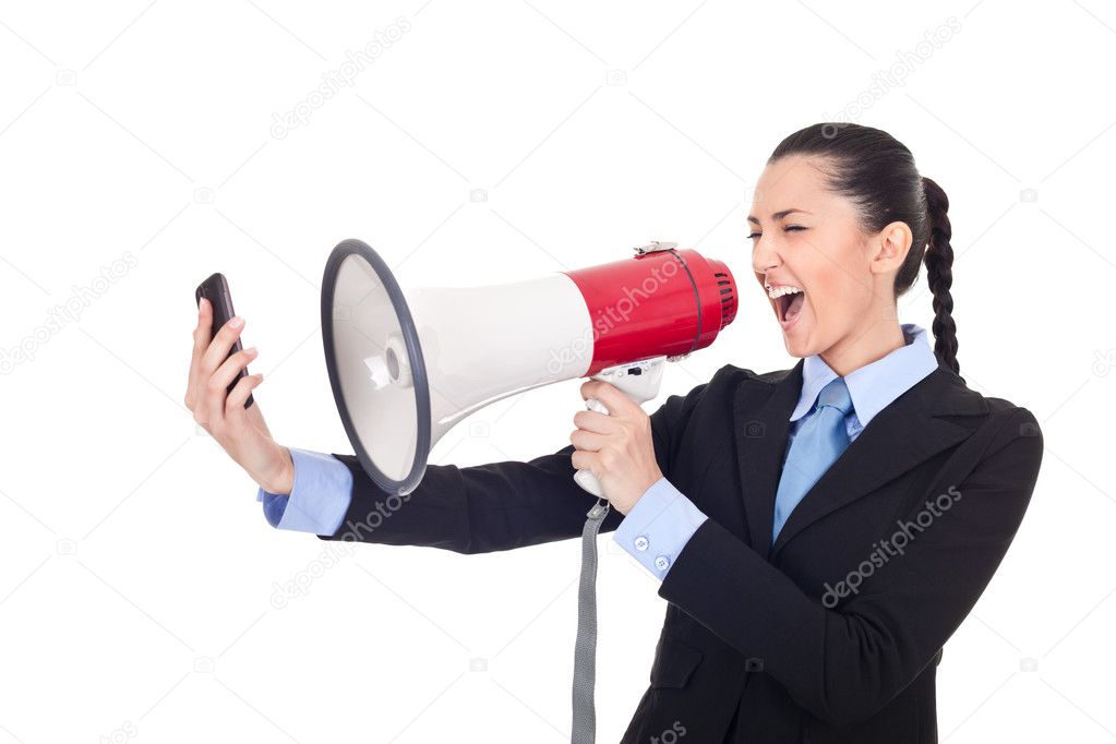 Businesswoman yelling on phone through megaphone