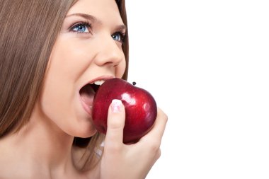 Woman biting a red apple clipart