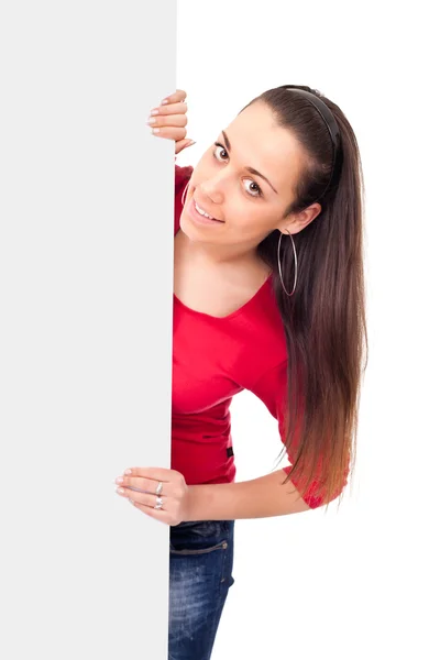 Nastolatka za puste billboard — Zdjęcie stockowe