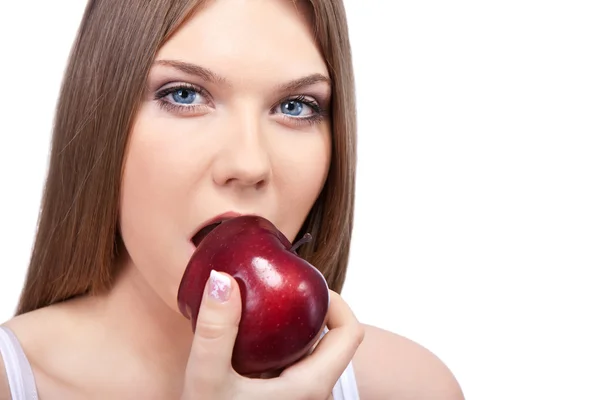 Mulher sensual mordendo maçã — Fotografia de Stock