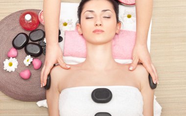 Treatment with hot stone clipart