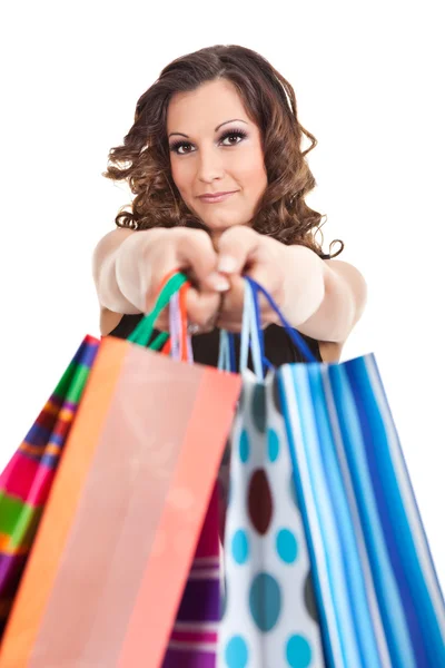 Portrait young adult girl with colored bags — Stock Photo, Image