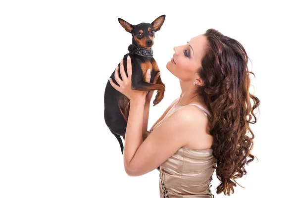 Woman holding her dog — Stock Photo, Image