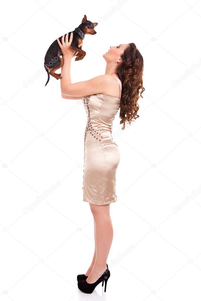 Attractive girl plying with dog