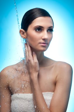 Water falling on woman shoulder clipart