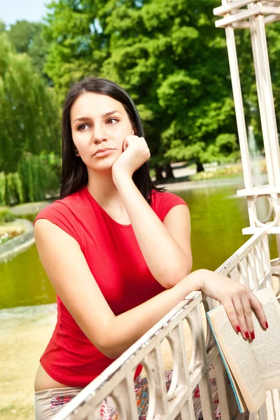 Thinking girl in park — Stock Photo, Image