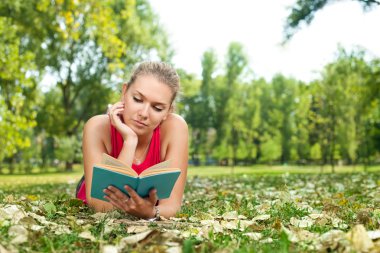 Student girl reading book outdoor clipart