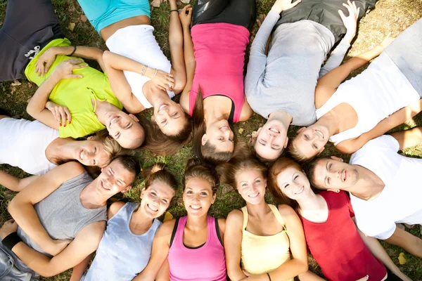 Students with heads in a circle — Stock Photo, Image