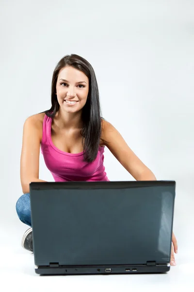 Young girl with laptop Royalty Free Stock Images