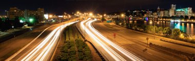 Light Trails and Portland City Skyline at Night clipart