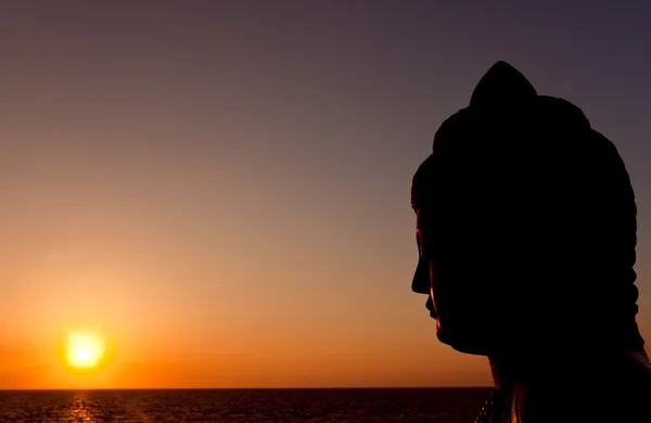 Sonnenuntergang-Buddha lizenzfreie Stockfotos