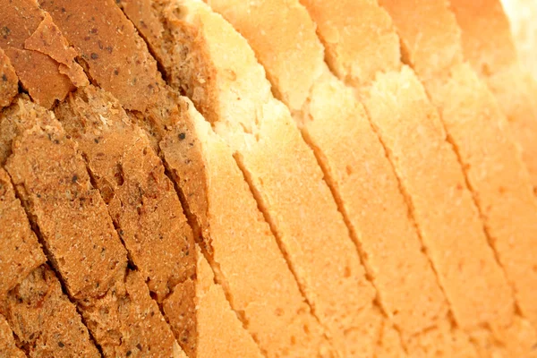 Sliced multicoloured bread — Stock Photo, Image