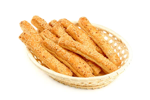 Bastoncini di grano con sesamo nel cestino — Foto Stock