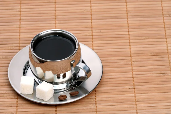 Kopp kaffe på matta — Stockfoto