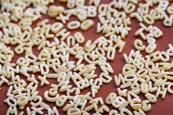 Eatable mini alphabet on table — Stock Photo, Image