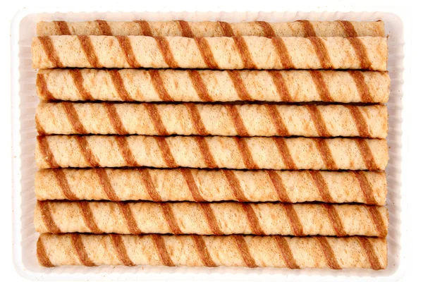 Striped wafer tubules with a chocolate cream — Stock Photo, Image