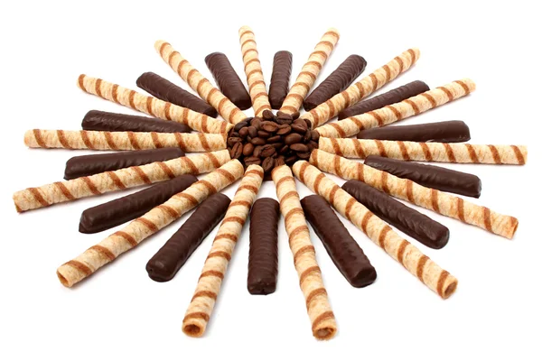 Chocolate sticks with a cream and the grains of coffee isolated — Stock Photo, Image