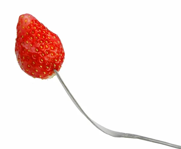 Strawberry in fork — Stock Photo, Image