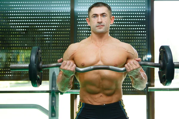 Bodybuilder and gym — Stock Photo, Image