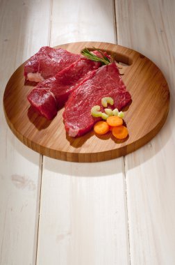 Raw steak with ingredients clipart