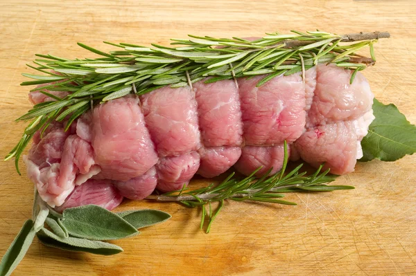 Raw veal rolled up — Stock Photo, Image