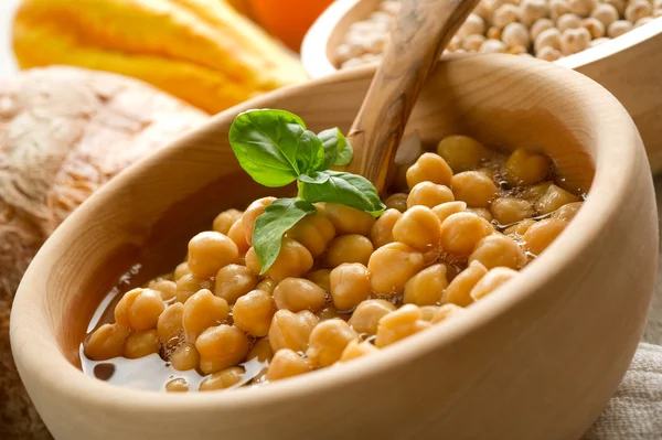Chickpeas soup on wood bowl — Stock Photo, Image