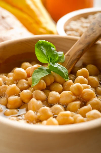 Chickpeas soup on wood bowl — Stock Photo, Image