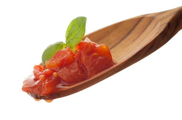 Tomato sauce over spoon — Stock Photo, Image