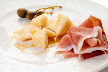 Appetizer parma cheese honey and parma ham clipart