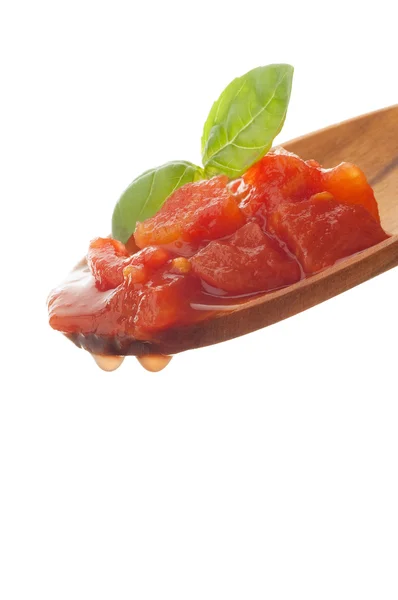 Tomatensauce über Löffel — Stockfoto