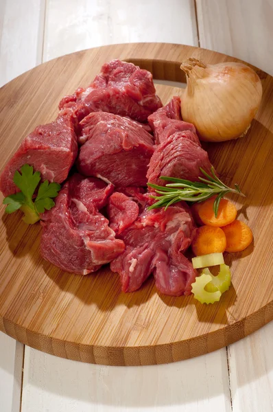 Raw stew meat with ingredients — Stock Photo, Image