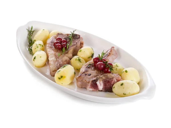 Lamb rib med röda vinbär och potatis-costolette agnello e ribes — Stockfoto