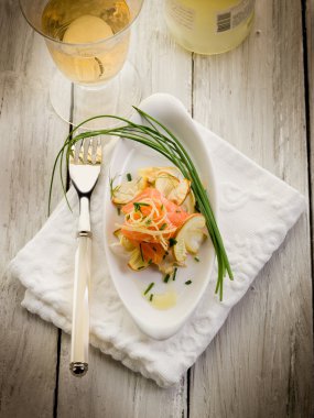 Salmon carpaccio with slice ovum mushroom salad clipart