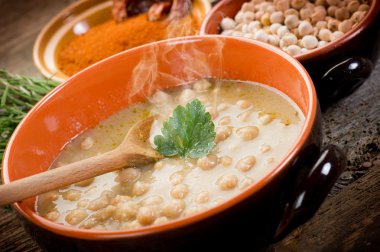 Chickpeas soup on bowl clipart