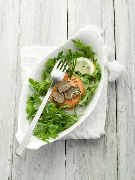 Salmon tartare with truffle and arugula salad — Stock Photo, Image