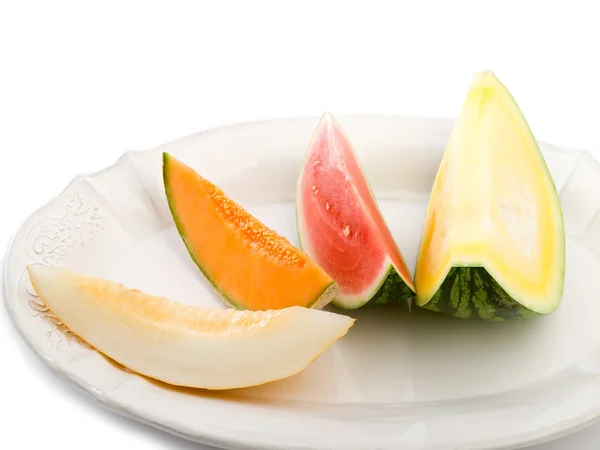 Variety of slice melon on dish — Stock Photo, Image