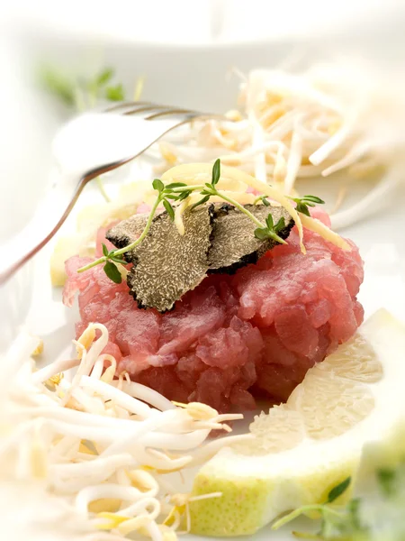 Tuna tartar with truffle and soy sprouts — Stock Photo, Image