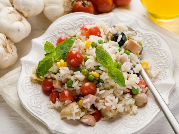 Rice salad with fresh tomatoes on dish — Stock Photo, Image