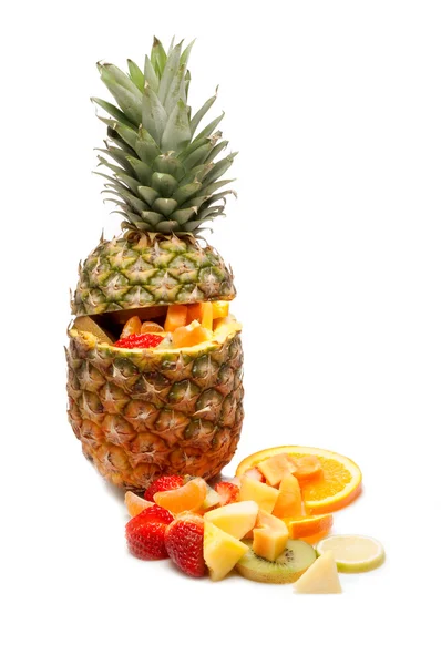 Sliced tropical fruits salad on pineapple — Stock Photo, Image