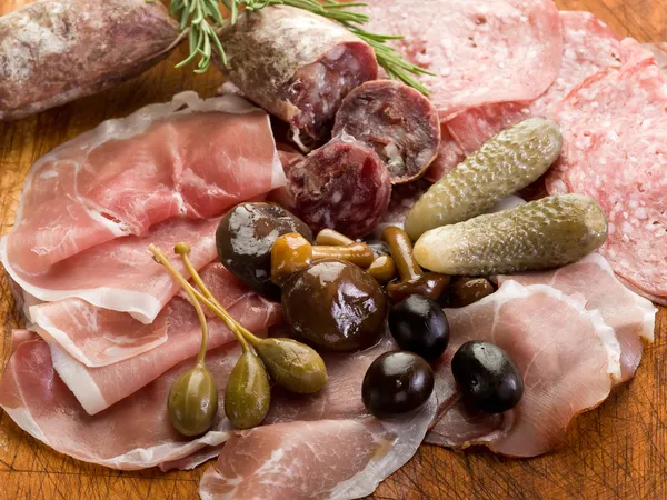 Italian appetizer with salami, grana,speck,mushroom,cucumber — Stock Photo, Image