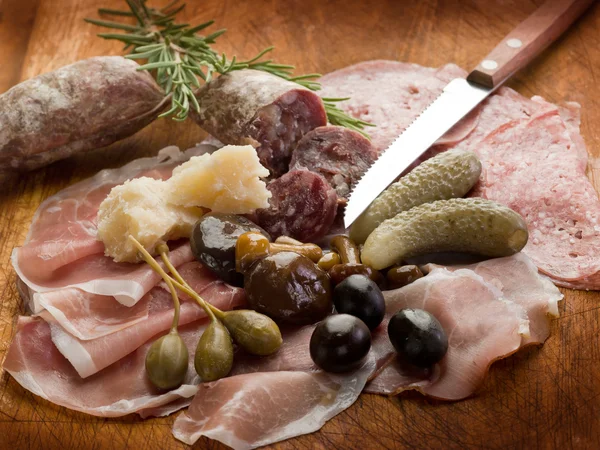 Italian appetizer with salami, grana,speck,mushroom,cucumber — Stock Photo, Image