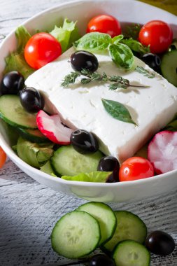 Feta traditional greek cheese and greek salad clipart