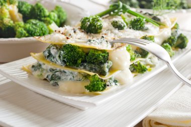 Vegetatarian lasagne with broccoli and spinach clipart